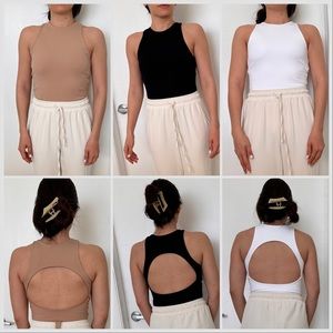 Set of 4 like new body suits open back detail